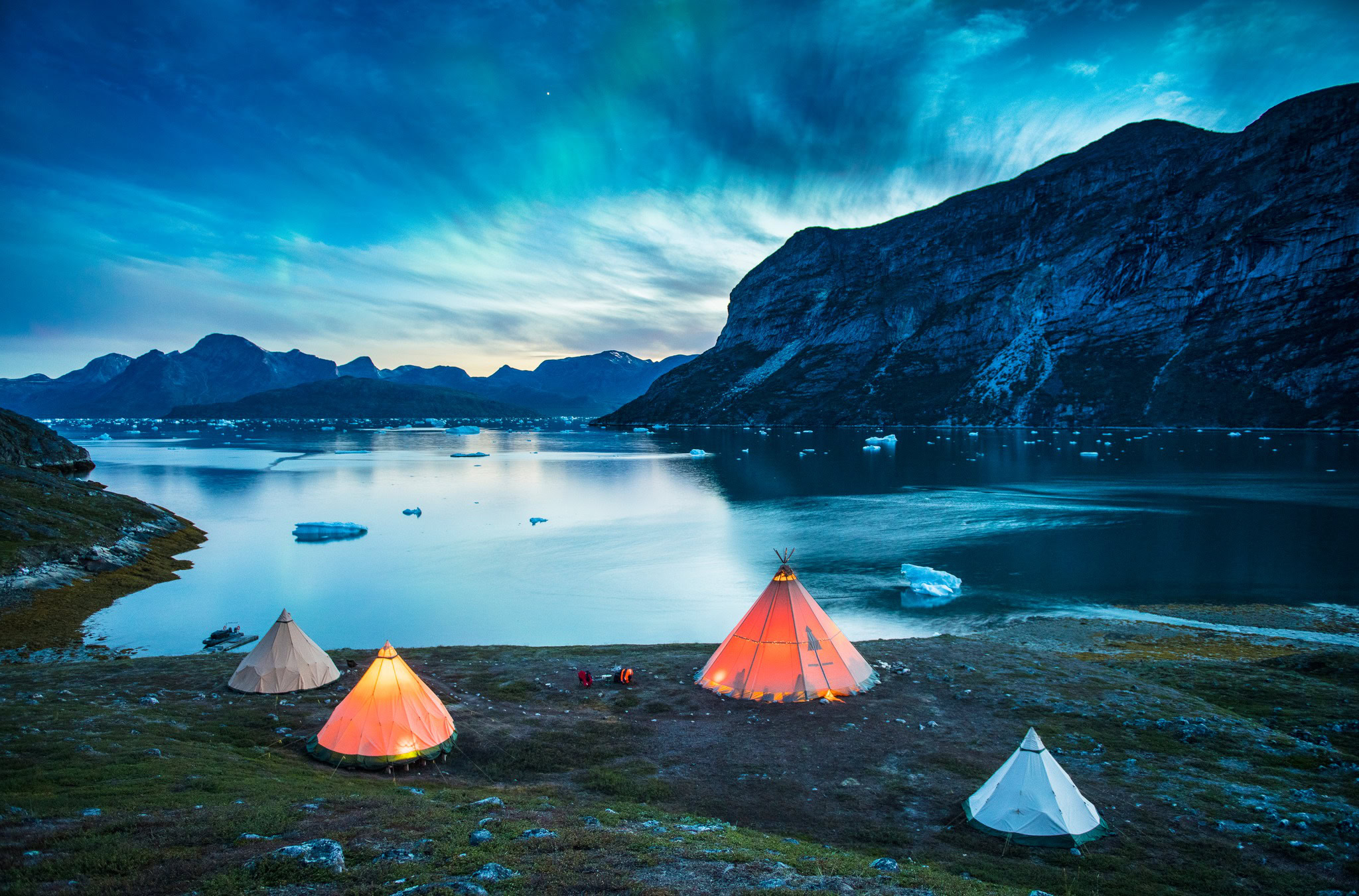 Colorful tents in a camp to shore- Nomad Greenland photo archive