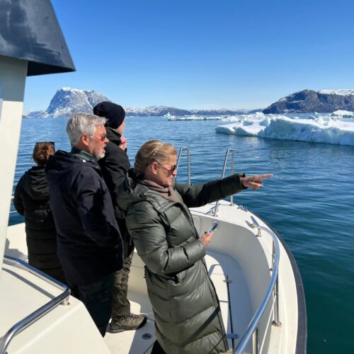 People on boat pointing at ice - Nuuk Outdoor Photo archive