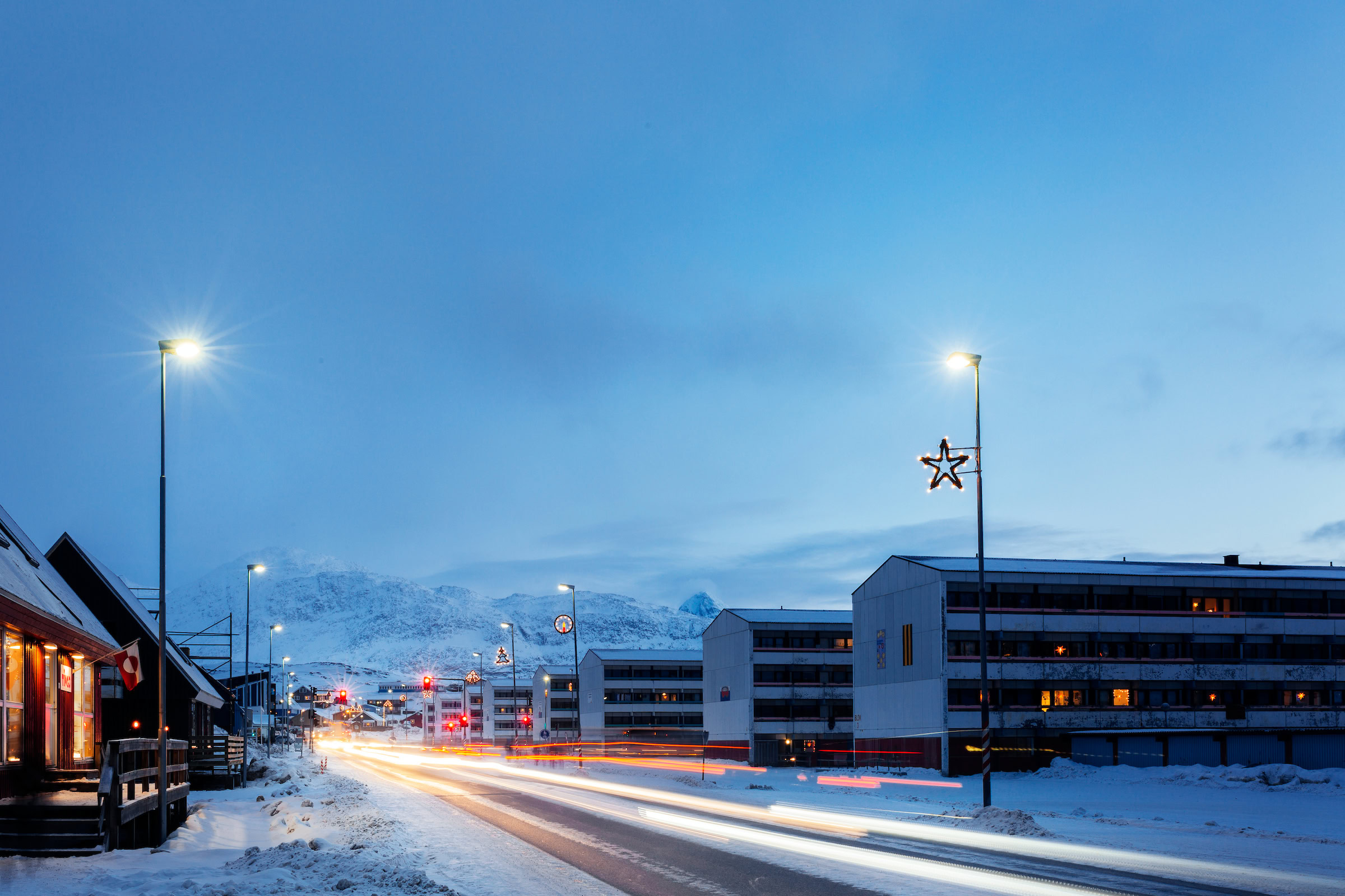 Long exposure photo of cars driving down the road in Nuuk in Greenland. Photo Rebecca Gustafsson-Visit Greenland