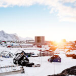 Sunrise over a snowcovered Nuuk in Greenland. Photo by Rebecca Gustafsson - Visit Greenland